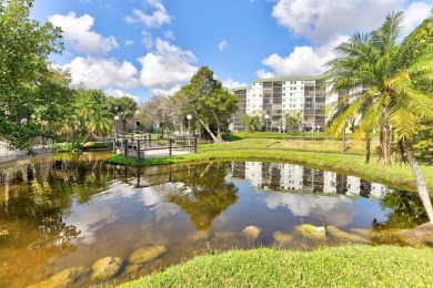 Must see! Highly desirable Cypress Bend community! Completely on Palm-Aire Country Club and Resort - Palms in Florida - for sale on GolfHomes.com, golf home, golf lot