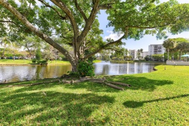 Must see! Highly desirable Cypress Bend community! Completely on Palm-Aire Country Club and Resort - Palms in Florida - for sale on GolfHomes.com, golf home, golf lot