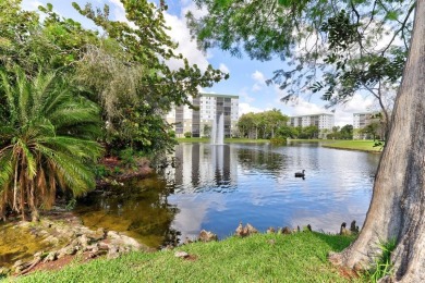Must see! Highly desirable Cypress Bend community! Completely on Palm-Aire Country Club and Resort - Palms in Florida - for sale on GolfHomes.com, golf home, golf lot