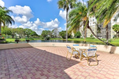 Must see! Highly desirable Cypress Bend community! Completely on Palm-Aire Country Club and Resort - Palms in Florida - for sale on GolfHomes.com, golf home, golf lot