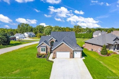 Gorgeous Golfside Home with Luxurious Amenities nestled in the on St Clair River Country Club in Michigan - for sale on GolfHomes.com, golf home, golf lot