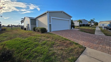 Nestled in the sought-after, gated 55+ community of Riverside on The Riverside Golf Club in Florida - for sale on GolfHomes.com, golf home, golf lot