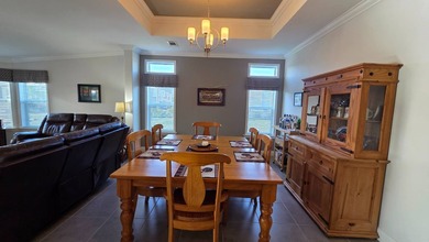 Nestled in the sought-after, gated 55+ community of Riverside on The Riverside Golf Club in Florida - for sale on GolfHomes.com, golf home, golf lot