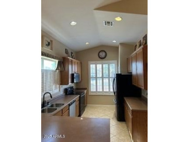 Beautiful home in a Golf community.  Attached to Dave White Golf on Dave White Reg Park and Golf Course in Arizona - for sale on GolfHomes.com, golf home, golf lot