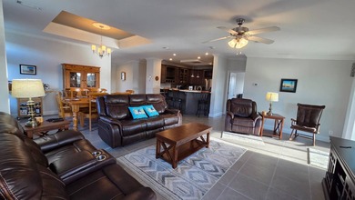 Nestled in the sought-after, gated 55+ community of Riverside on The Riverside Golf Club in Florida - for sale on GolfHomes.com, golf home, golf lot