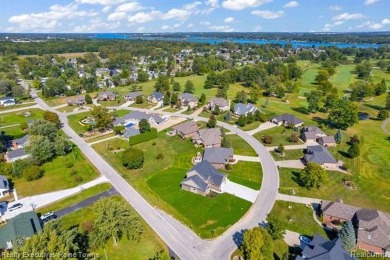 Gorgeous Golfside Home with Luxurious Amenities nestled in the on St Clair River Country Club in Michigan - for sale on GolfHomes.com, golf home, golf lot