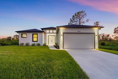 Welcome to your Florida dream home! This gorgeous newly built on Sabal Trace Golf and Country Club in Florida - for sale on GolfHomes.com, golf home, golf lot