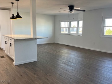 Come make this beautifully remodeled home YOURS!!!. NEW FLOORS on Six Lakes Country Club in Florida - for sale on GolfHomes.com, golf home, golf lot