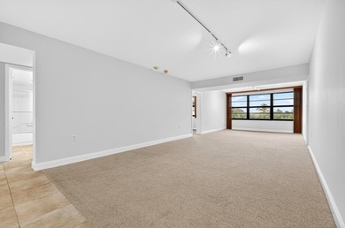 Enjoy top-floor living in this desirable fourth-floor corner on Bear Lakes Country Club in Florida - for sale on GolfHomes.com, golf home, golf lot