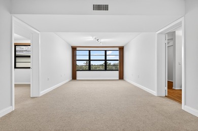 Enjoy top-floor living in this desirable fourth-floor corner on Bear Lakes Country Club in Florida - for sale on GolfHomes.com, golf home, golf lot