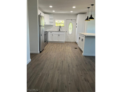 Come make this beautifully remodeled home YOURS!!!. NEW FLOORS on Six Lakes Country Club in Florida - for sale on GolfHomes.com, golf home, golf lot