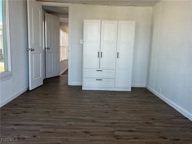 Come make this beautifully remodeled home YOURS!!!. NEW FLOORS on Six Lakes Country Club in Florida - for sale on GolfHomes.com, golf home, golf lot