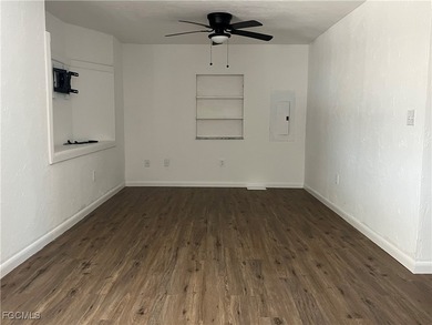 Come make this beautifully remodeled home YOURS!!!. NEW FLOORS on Six Lakes Country Club in Florida - for sale on GolfHomes.com, golf home, golf lot