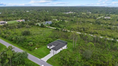 Welcome to your Florida dream home! This gorgeous newly built on Sabal Trace Golf and Country Club in Florida - for sale on GolfHomes.com, golf home, golf lot