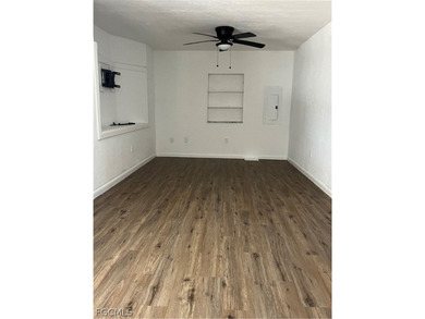 Come make this beautifully remodeled home YOURS!!!. NEW FLOORS on Six Lakes Country Club in Florida - for sale on GolfHomes.com, golf home, golf lot