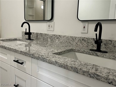 Come make this beautifully remodeled home YOURS!!!. NEW FLOORS on Six Lakes Country Club in Florida - for sale on GolfHomes.com, golf home, golf lot