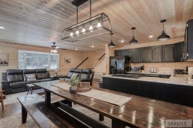 This short term rental sets in the heart of Island Park on Island Park Village Resort Golf Course in Idaho - for sale on GolfHomes.com, golf home, golf lot