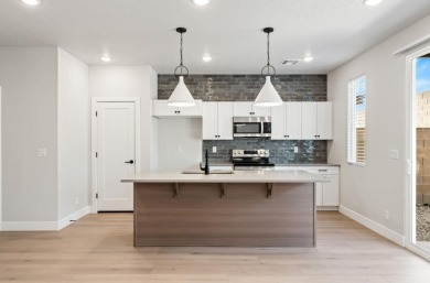 Welcome to the Sunburst, a beautifully crafted 2-story townhome on  in Utah - for sale on GolfHomes.com, golf home, golf lot
