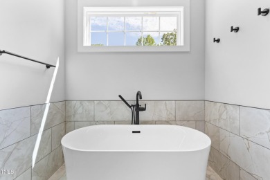 This gorgeous 5-bedroom, 3.5-bath home offers exceptional on Olde Liberty Golf and Country Club in North Carolina - for sale on GolfHomes.com, golf home, golf lot