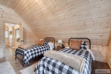 This short term rental sets in the heart of Island Park on Island Park Village Resort Golf Course in Idaho - for sale on GolfHomes.com, golf home, golf lot