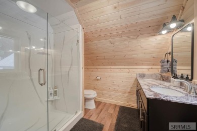 This short term rental sets in the heart of Island Park on Island Park Village Resort Golf Course in Idaho - for sale on GolfHomes.com, golf home, golf lot