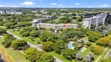 LOVE where you live in this beautifully renovated 4th Floor on Palm-Aire Country Club and Resort - Palms in Florida - for sale on GolfHomes.com, golf home, golf lot