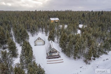 This short term rental sets in the heart of Island Park on Island Park Village Resort Golf Course in Idaho - for sale on GolfHomes.com, golf home, golf lot
