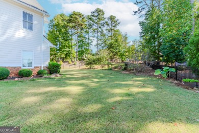 This beautiful and meticulously maintained home, with distinct on Traditions of Braselton Golf Club in Georgia - for sale on GolfHomes.com, golf home, golf lot