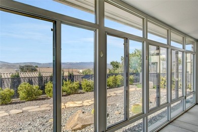 Enjoy spectacular panoramic city, valley and mountain views from on Revere Golf Club in Nevada - for sale on GolfHomes.com, golf home, golf lot