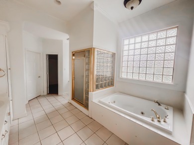 This inviting two-story home offers four bedrooms and on Monticello Country Club in Arkansas - for sale on GolfHomes.com, golf home, golf lot