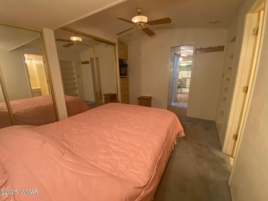 This spacious park model features lots of windows, a woodburning on Juniper Ridge R.V. Golf Resort in Arizona - for sale on GolfHomes.com, golf home, golf lot