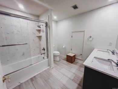 This inviting two-story home offers four bedrooms and on Monticello Country Club in Arkansas - for sale on GolfHomes.com, golf home, golf lot