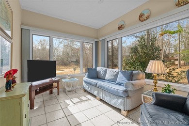 Discover serene golf course living in the prestigious gated on Carolina Trace Country Club in North Carolina - for sale on GolfHomes.com, golf home, golf lot