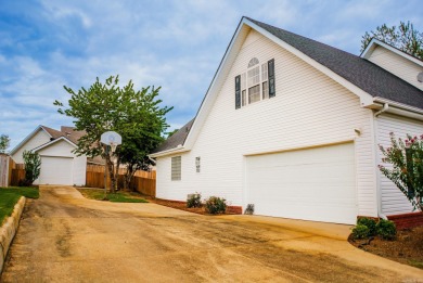This inviting two-story home offers four bedrooms and on Monticello Country Club in Arkansas - for sale on GolfHomes.com, golf home, golf lot