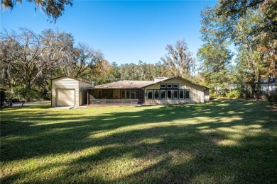 Nestled within the Gainesville Country Club, this extensively on Gainesville Golf and Country Club in Florida - for sale on GolfHomes.com, golf home, golf lot