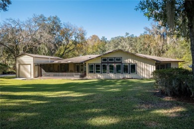 Nestled within the Gainesville Country Club, this extensively on Gainesville Golf and Country Club in Florida - for sale on GolfHomes.com, golf home, golf lot