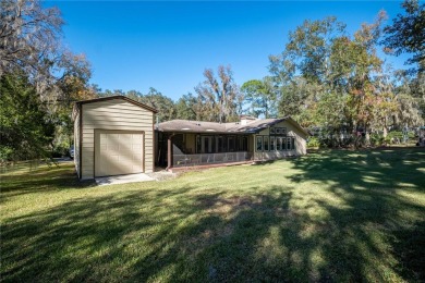 Nestled within the Gainesville Country Club, this extensively on Gainesville Golf and Country Club in Florida - for sale on GolfHomes.com, golf home, golf lot