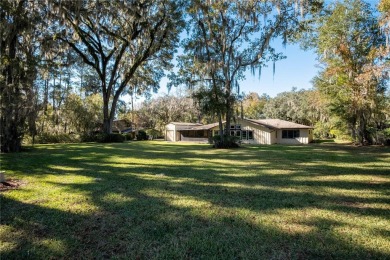 Nestled within the Gainesville Country Club, this extensively on Gainesville Golf and Country Club in Florida - for sale on GolfHomes.com, golf home, golf lot