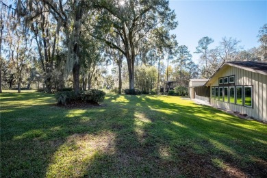 Nestled within the Gainesville Country Club, this extensively on Gainesville Golf and Country Club in Florida - for sale on GolfHomes.com, golf home, golf lot