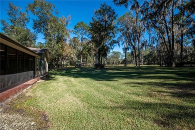 Nestled within the Gainesville Country Club, this extensively on Gainesville Golf and Country Club in Florida - for sale on GolfHomes.com, golf home, golf lot