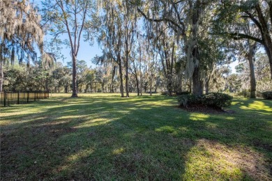 Nestled within the Gainesville Country Club, this extensively on Gainesville Golf and Country Club in Florida - for sale on GolfHomes.com, golf home, golf lot