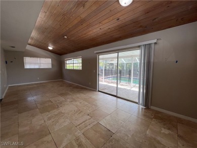 Spacious 3-bedroom, 2-bath, 2-car garage pool home in the heart on Estero Country Club in Florida - for sale on GolfHomes.com, golf home, golf lot