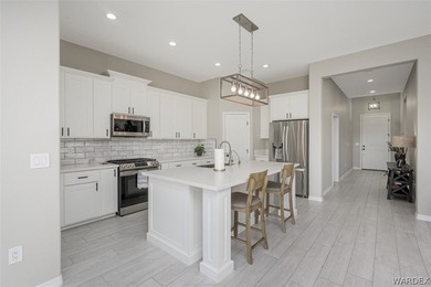 This contemporary home is located in the beautiful and gated Los on Los Lagos Golf Club in Arizona - for sale on GolfHomes.com, golf home, golf lot