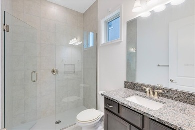 Positioned on one of the most desirable pond and golf view lots on Eagle Creek Golf Club in Florida - for sale on GolfHomes.com, golf home, golf lot