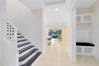 Positioned on one of the most desirable pond and golf view lots on Eagle Creek Golf Club in Florida - for sale on GolfHomes.com, golf home, golf lot