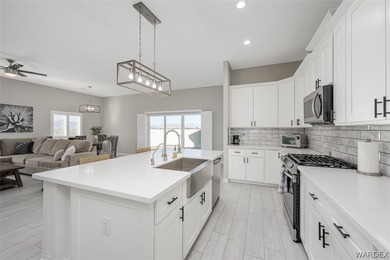 This contemporary home is located in the beautiful and gated Los on Los Lagos Golf Club in Arizona - for sale on GolfHomes.com, golf home, golf lot