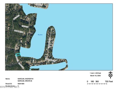 Stunning waterfront brick home located in the gated community of on Woodlake Country Club in North Carolina - for sale on GolfHomes.com, golf home, golf lot