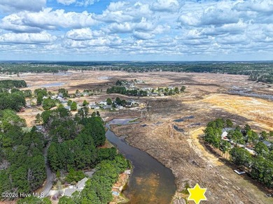 Stunning waterfront brick home located in the gated community of on Woodlake Country Club in North Carolina - for sale on GolfHomes.com, golf home, golf lot