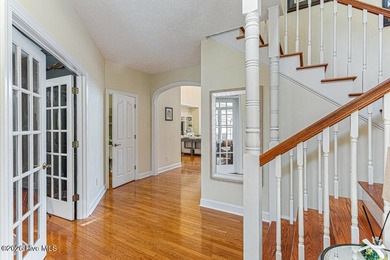 Stunning waterfront brick home located in the gated community of on Woodlake Country Club in North Carolina - for sale on GolfHomes.com, golf home, golf lot