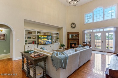 Stunning waterfront brick home located in the gated community of on Woodlake Country Club in North Carolina - for sale on GolfHomes.com, golf home, golf lot